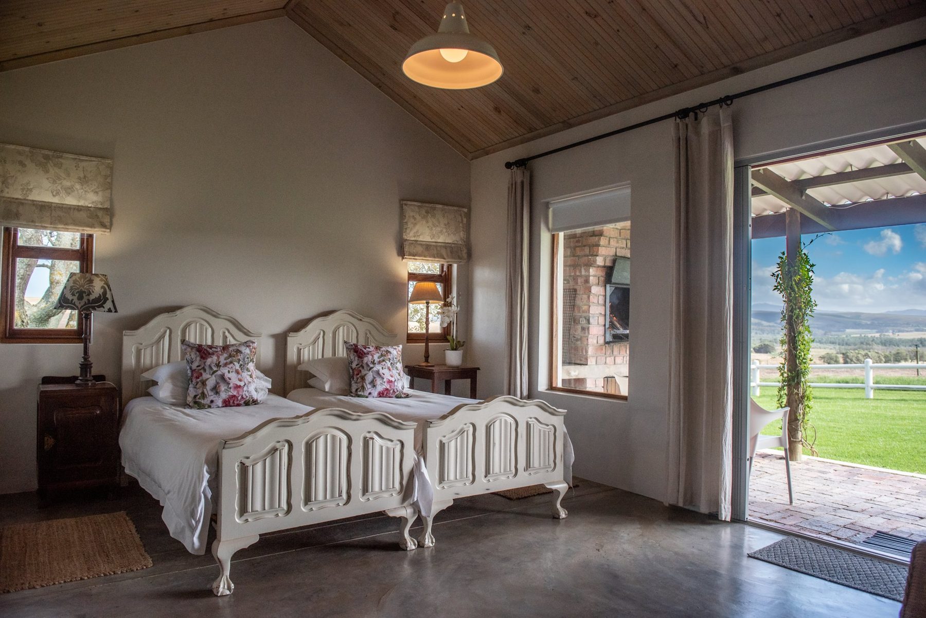 Merino — twin bedroom opening to the veranda at Landmeterskop Farm Cottages