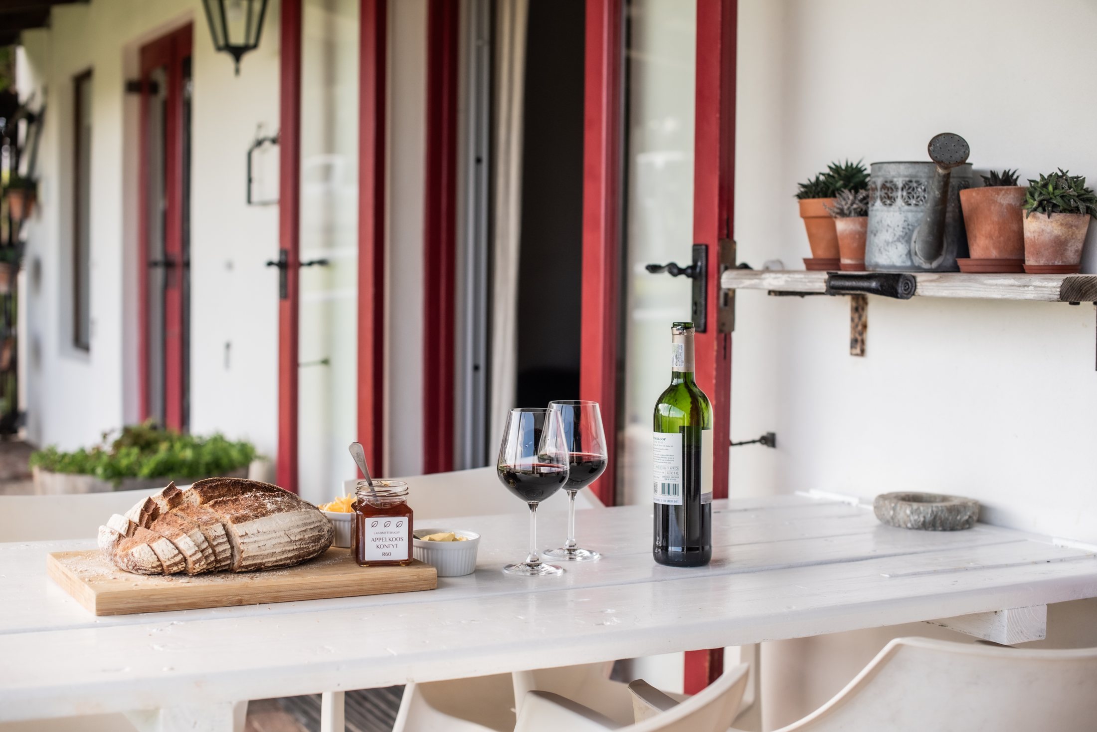 Merino — kitchen and dining counter at Landmeterskop Farm Cottages