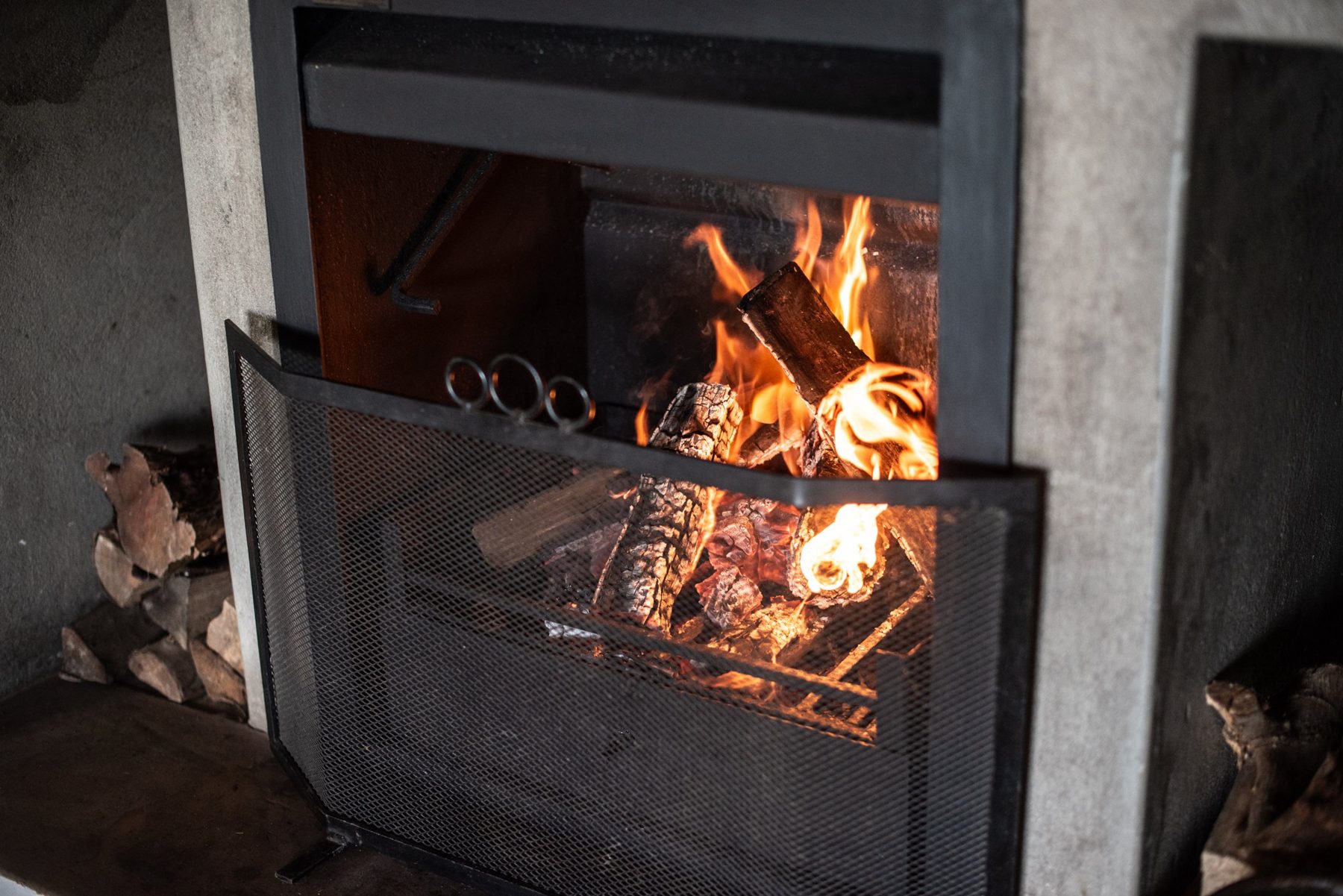 Merino — fireplace at Landmeterskop Farm Cottages