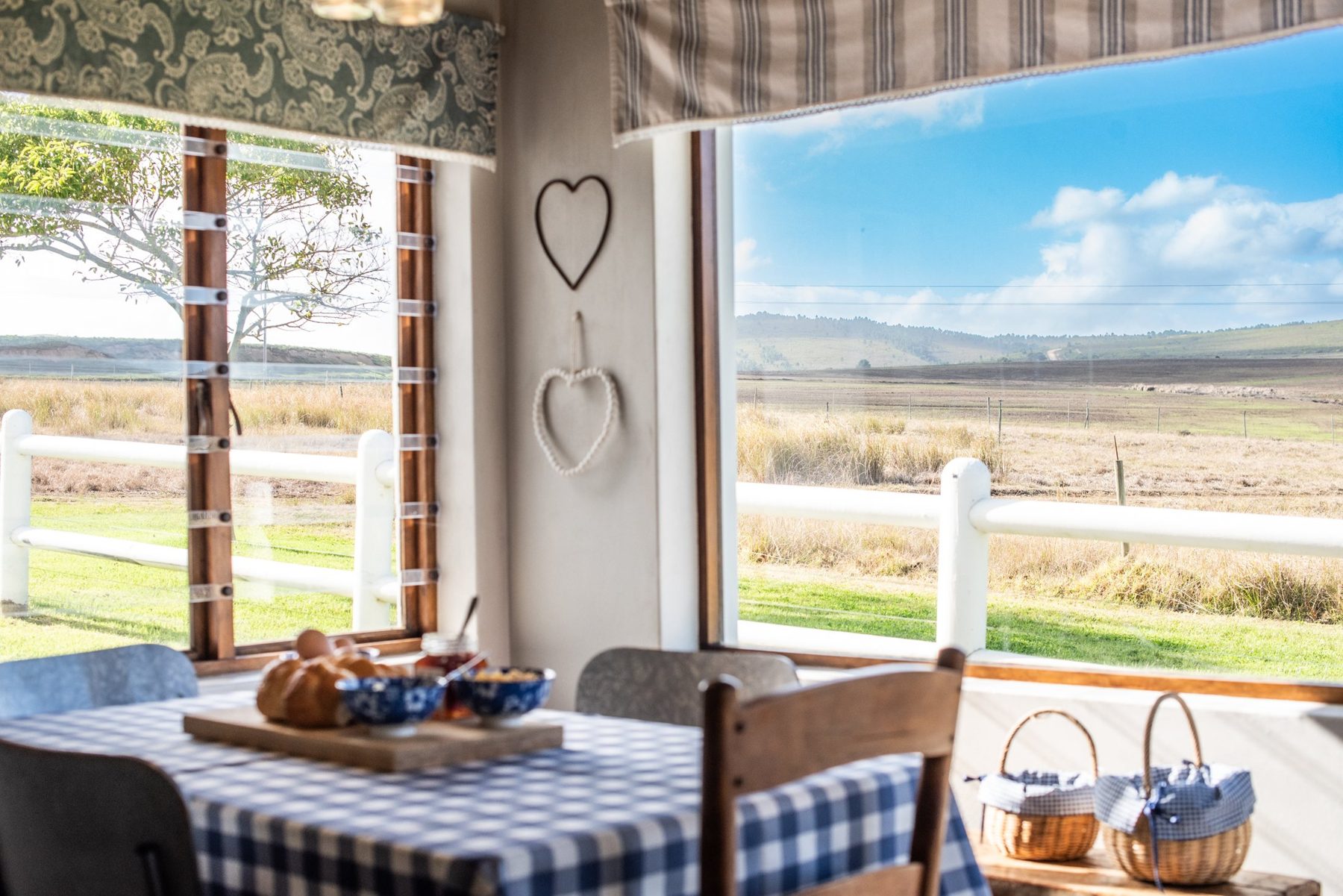 Dormer — dining area and farm view at Landmeterskop Farm Cottages