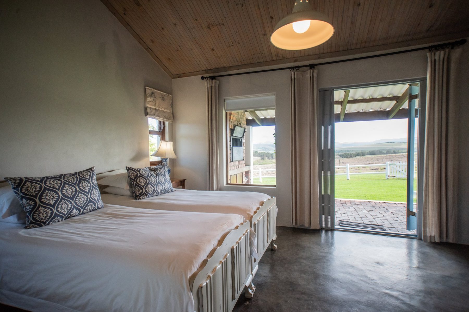 Dormer — bedroom opening to the veranda at Landmeterskop Farm Cottages