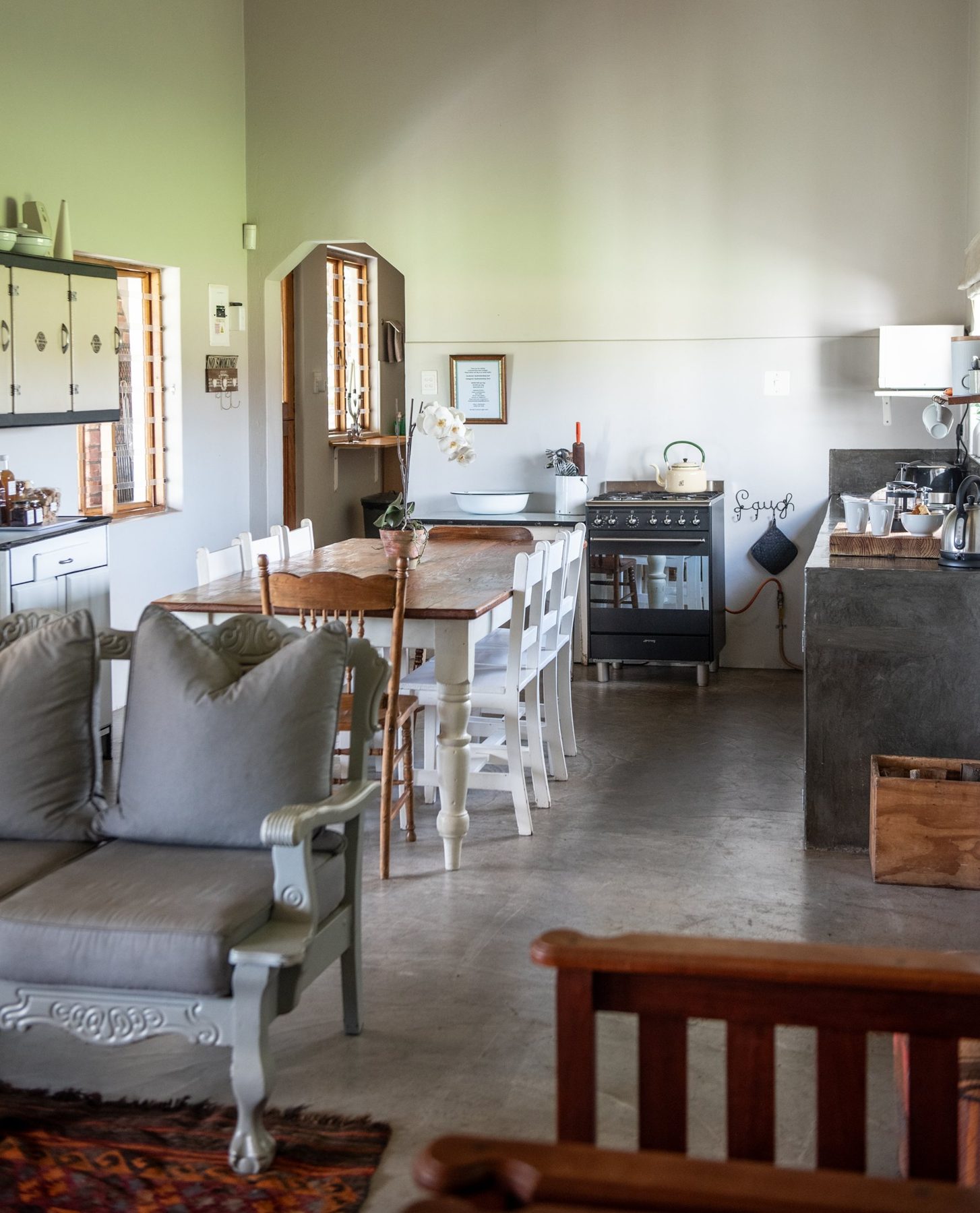Karakul — open-plan kitchen, dining and lounge at Landmeterskop Farm Cottages